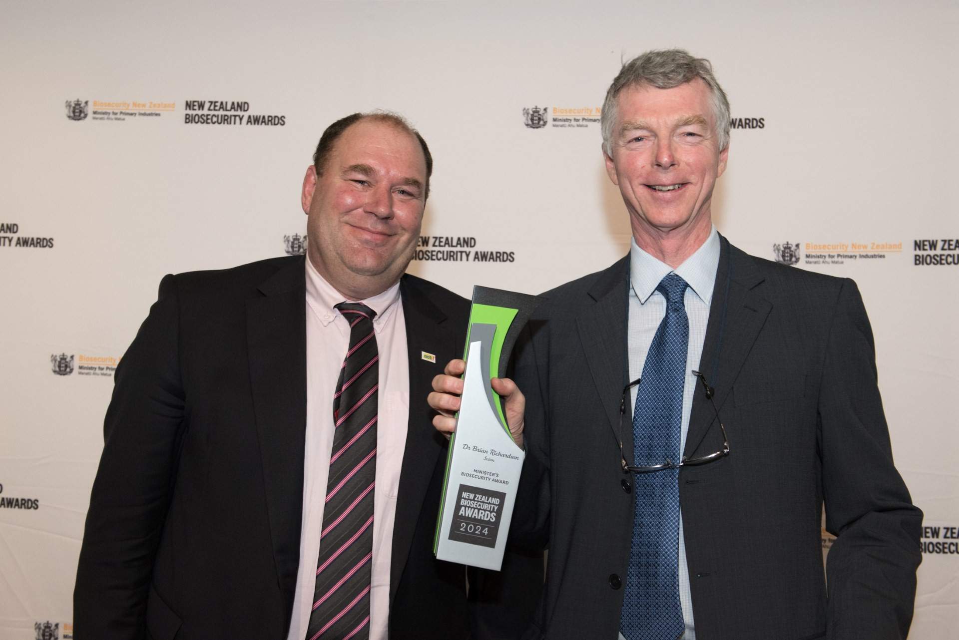 Biosecurity Minister Andrew Hoggard (left) with the Minister's Biosecurity Award winner Dr Brian Richardson (right).